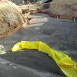 sand over membrane at basement slab